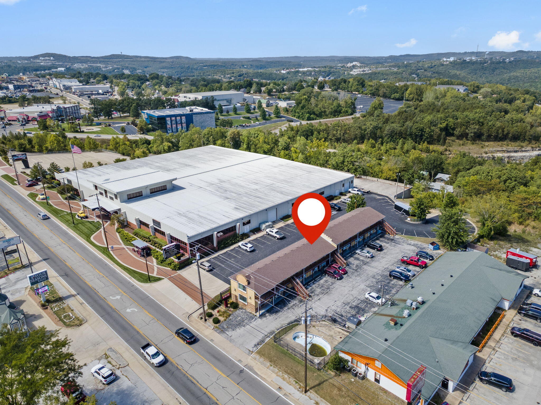 Photo 2 - Commercial Sale for sale – 1325 W 76 Country Boulevard  Branson, MO