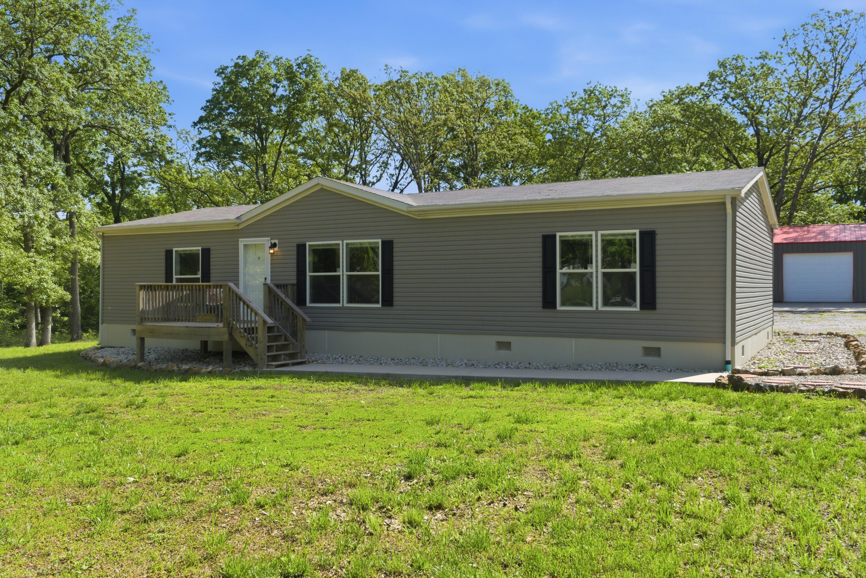 Photo 3 - Residential for sale – 22227  Doe Run Trail  Wheatland, MO