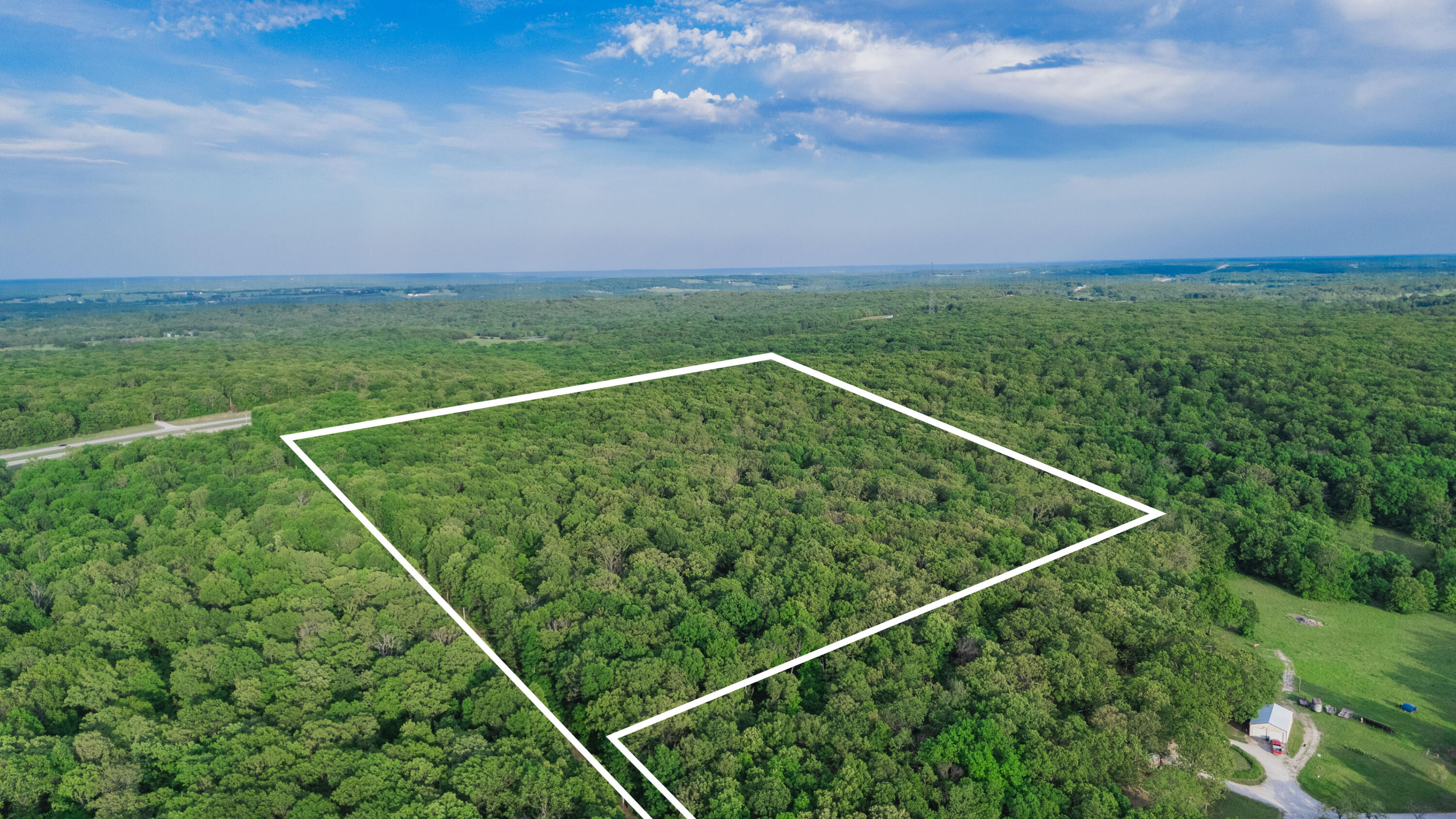 Land for sale – 001 S 52nd Road  Dunnegan, MO