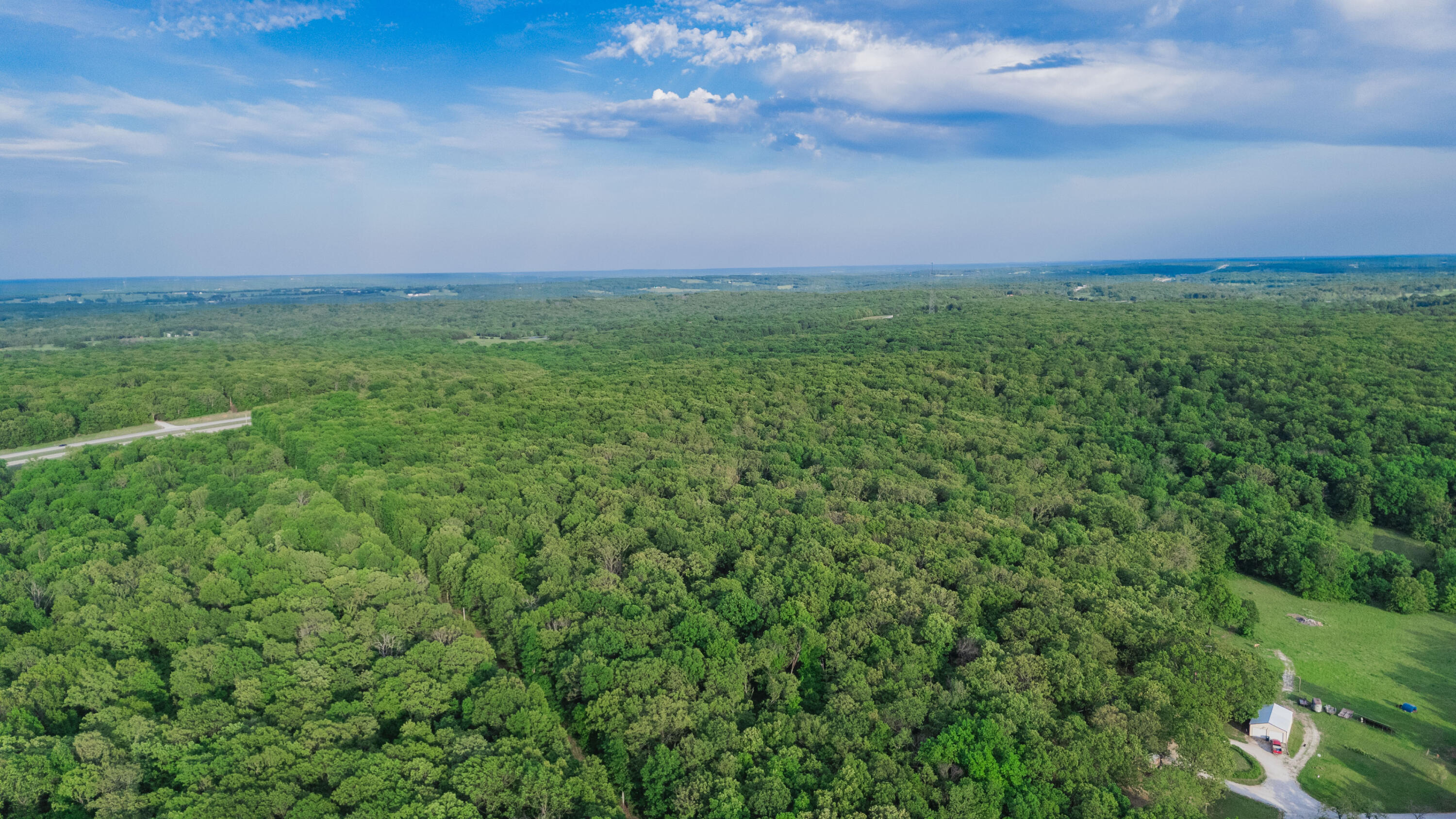 Photo 2 - Land for sale – 001 S 52nd Road  Dunnegan, MO