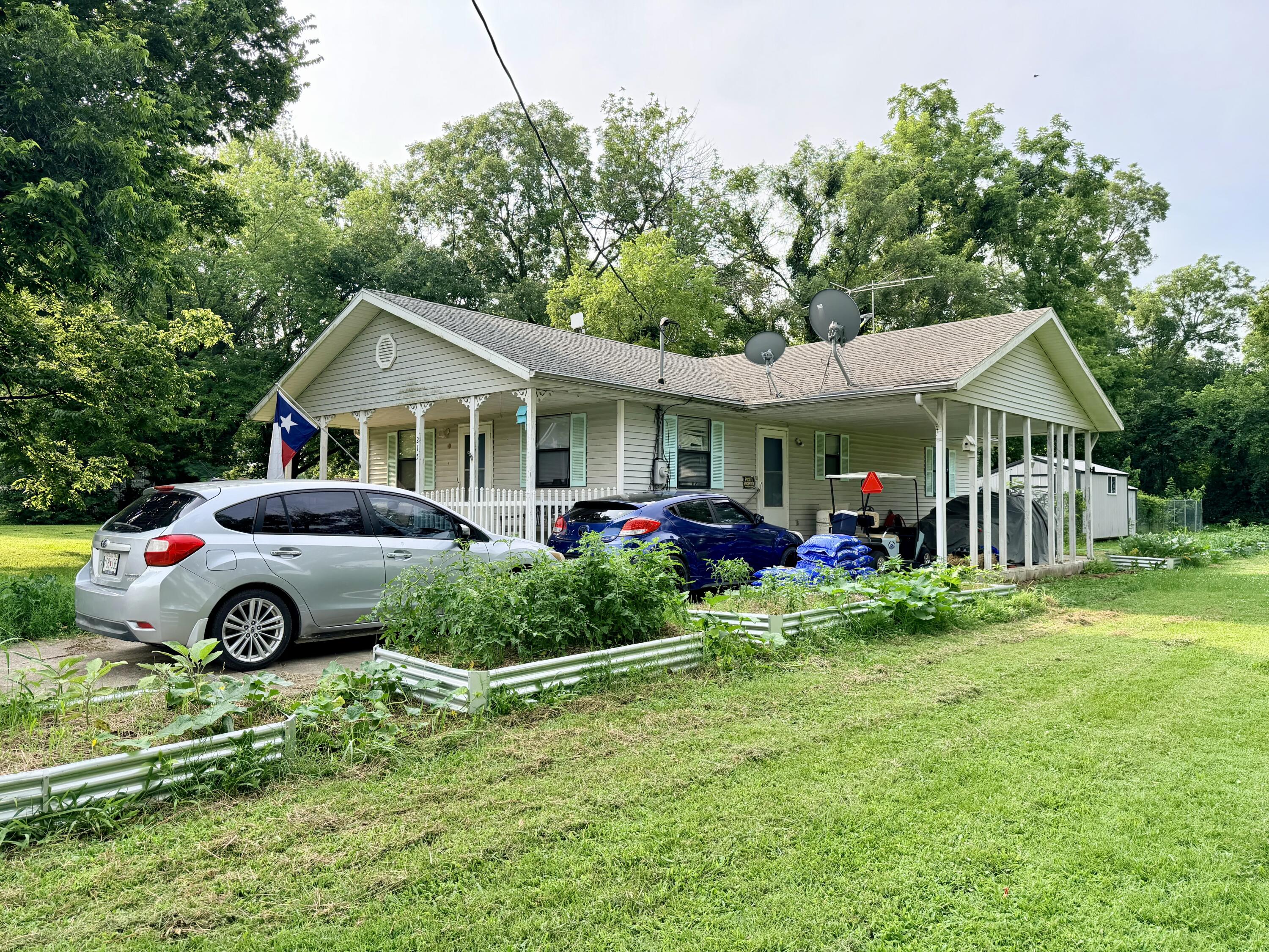 Photo 3 - Residential for sale – 215  Mc Pherson Street  Greenfield, MO