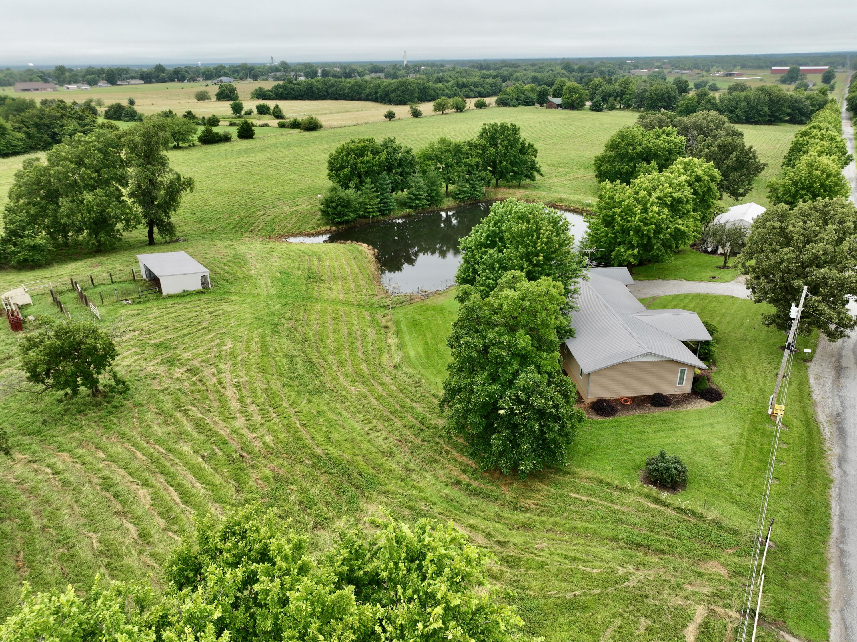Photo 3 - Residential for sale – 12459  Farm Road 1015   Exeter, MO