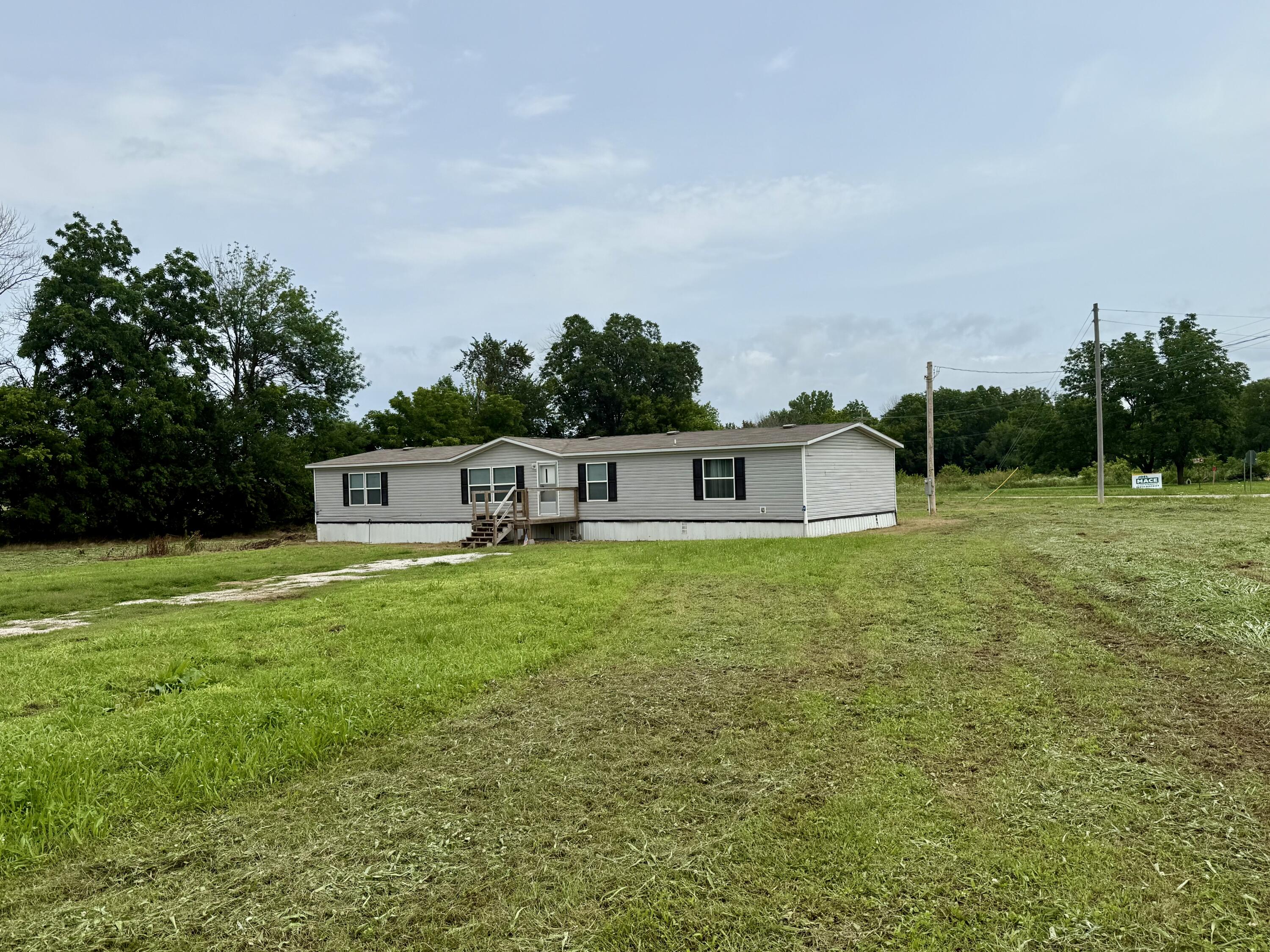 Photo 2 - Residential for sale – 12950  Highway M   Stark City, MO