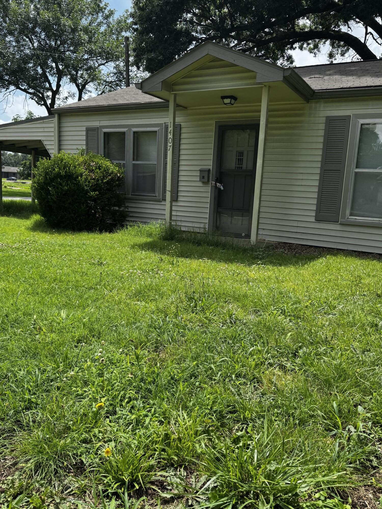 Photo 2 - Residential for sale – 1407  Grand Street  Lamar, MO