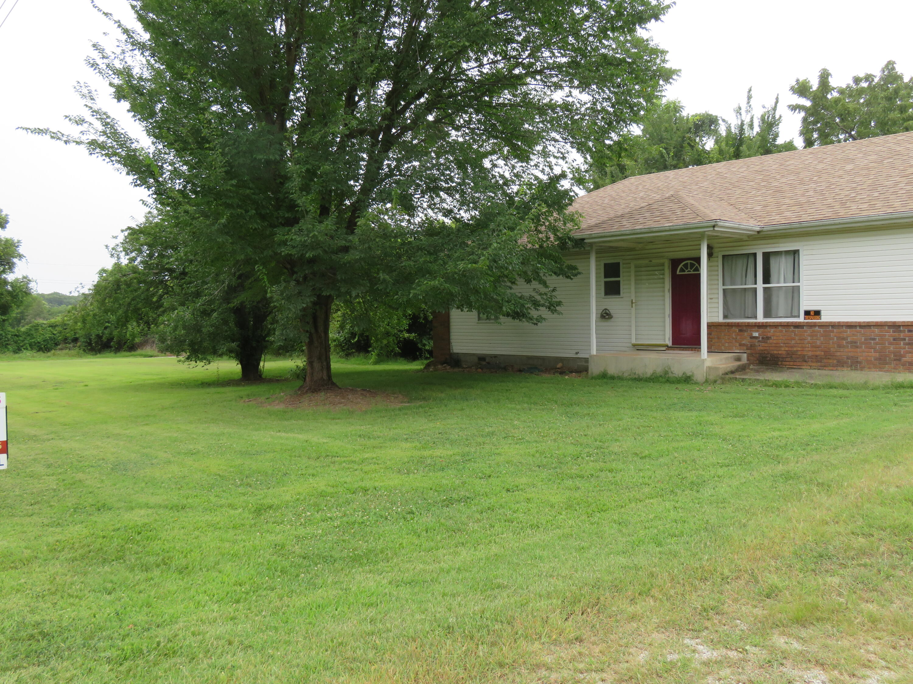 Photo 3 - Residential for sale – 411 E 330th Road  Humansville, MO