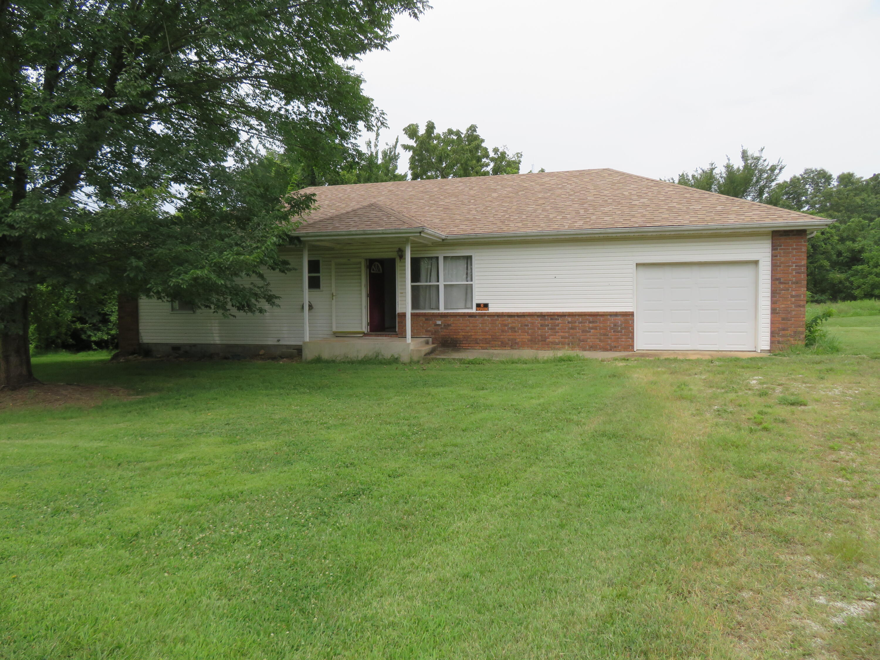 Photo 5 - Residential for sale – 411 E 330th Road  Humansville, MO