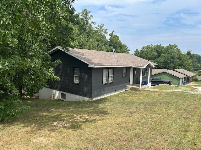 Photo 2 - Residential Income for sale – 106 W South Street  Neosho, MO