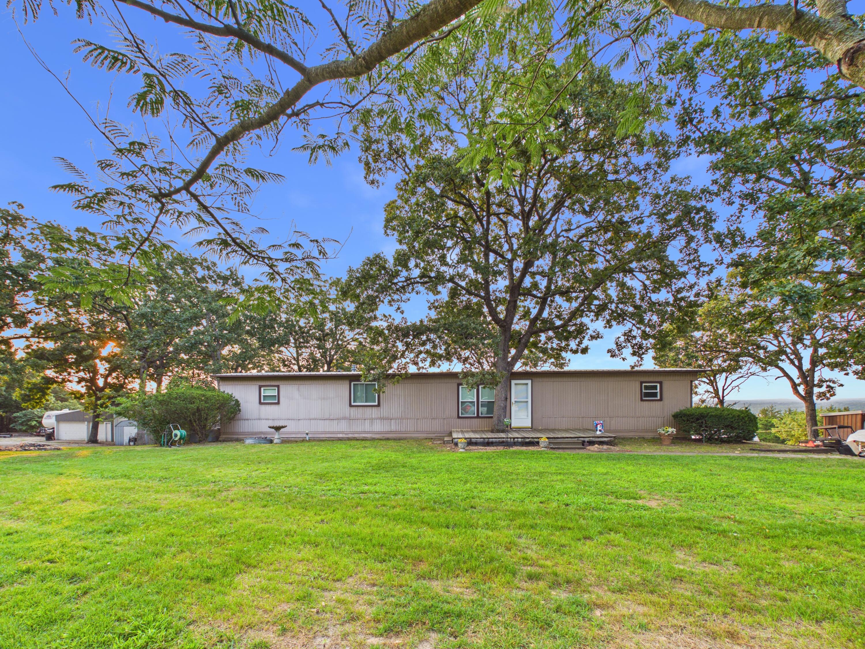 Photo 2 - Residential for sale – 22565  County Road 203   Wheatland, MO