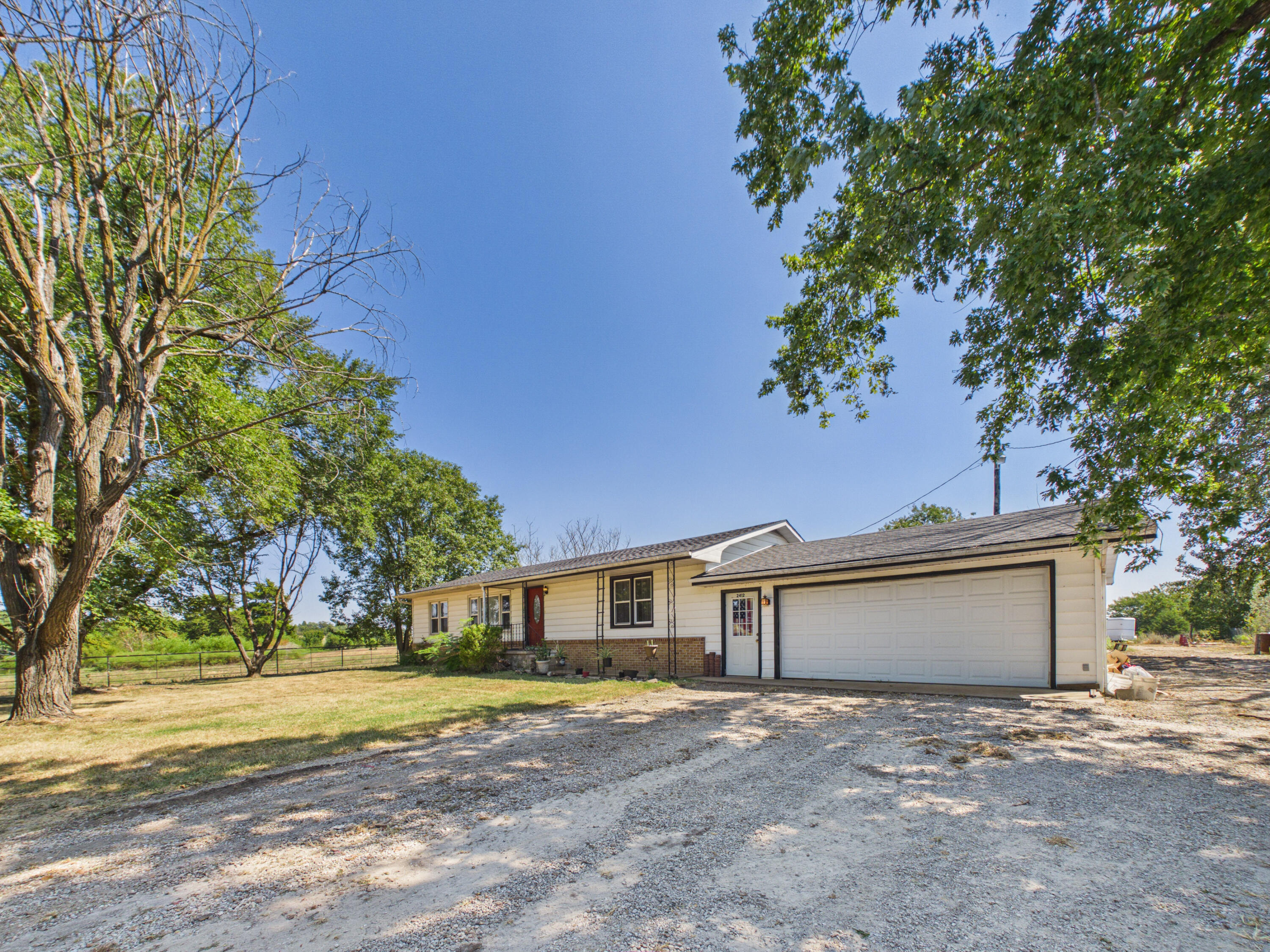 Photo 3 - Residential for sale – 2412  Us Highway 65   Louisburg, MO