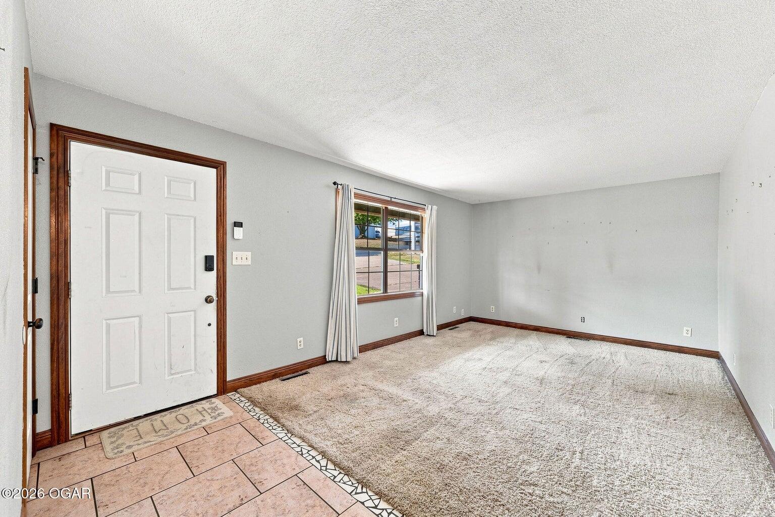 Photo 3 - Residential for sale – 104 W South Street  Neosho, MO